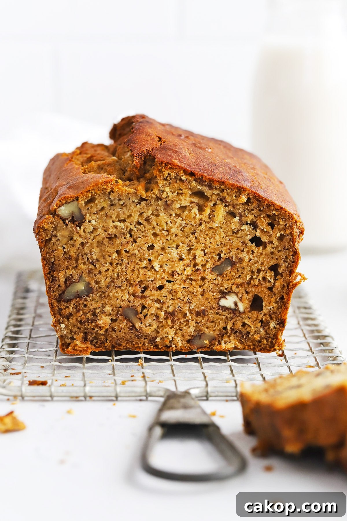 Brown Butter Banana Bread (Gluten-Free Recipe) 9 Front view of gluten-free brown butter banana bread being sliced