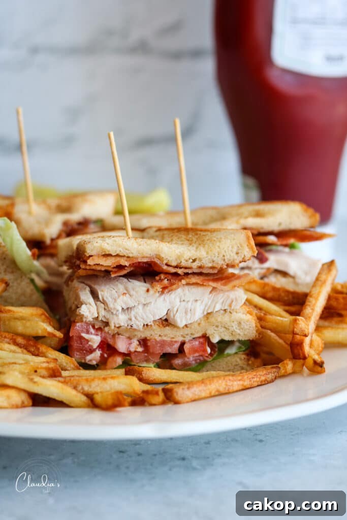 Classic Turkey Club Sandwich Recipe with Crispy Bacon & Avocado 2 classic turkey club sandwich version 2 close up