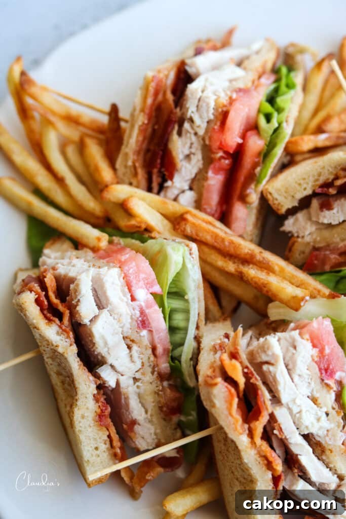 Classic Turkey Club Sandwich Recipe with Crispy Bacon & Avocado 4 turkey club with french fries
