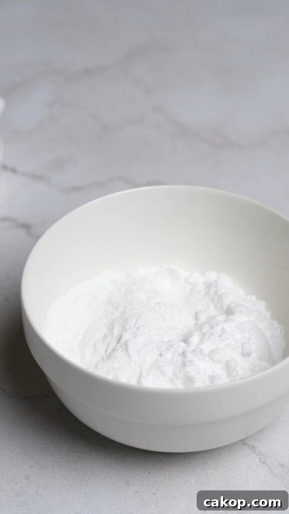 A bowl of powdered sugar and instant clearjel for stabilized whipped cream.