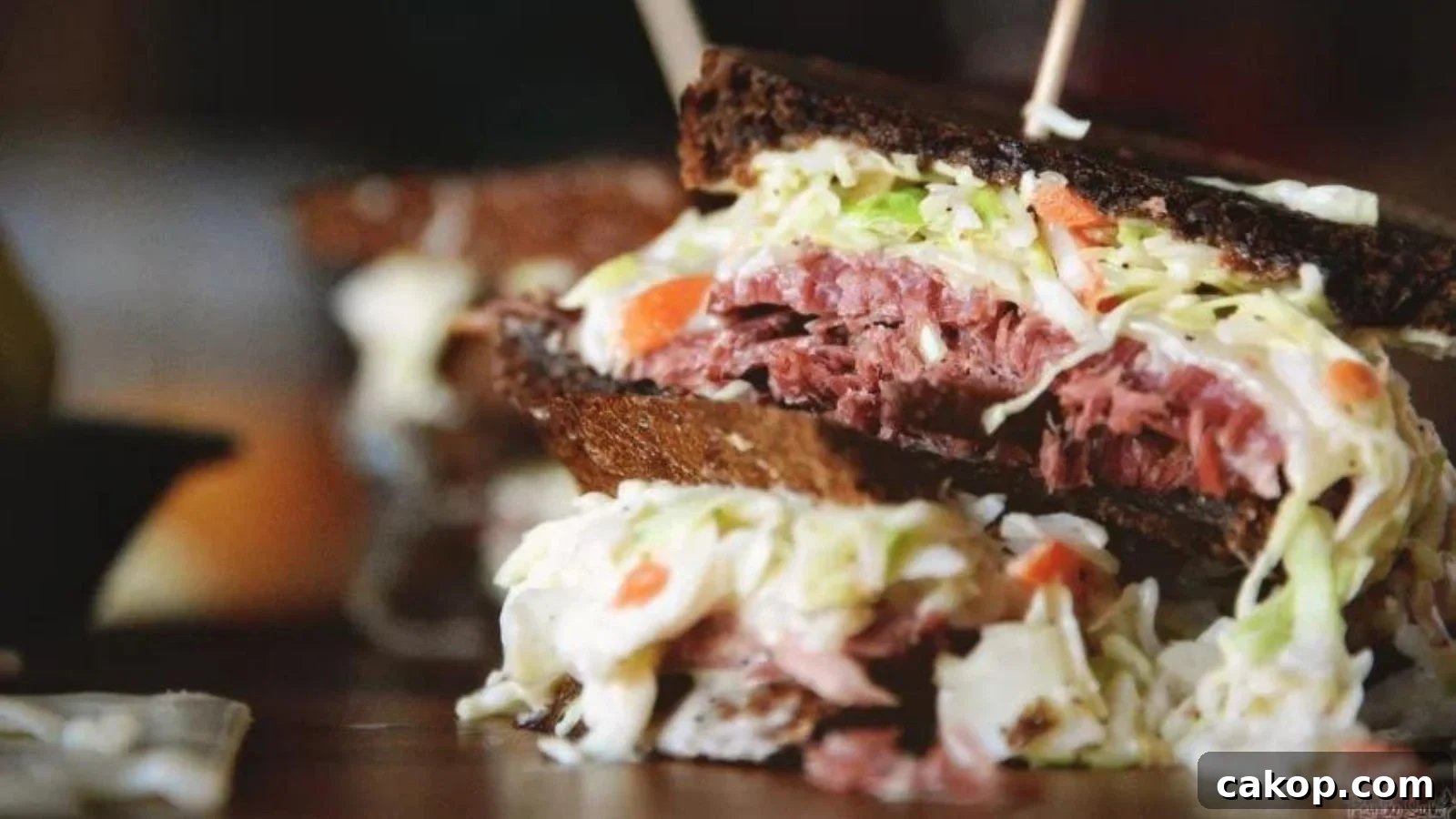 Corned beef sandwich stacked high on rye bread.