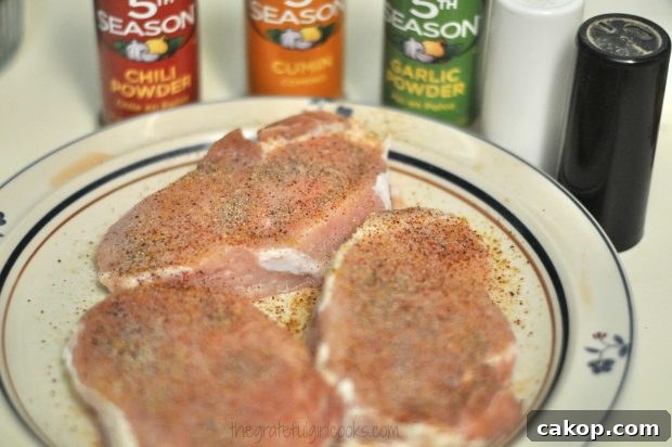 Pork chops are lightly seasoned with Southwestern spices.