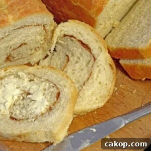 A bunch of homemade bread that is sliced
