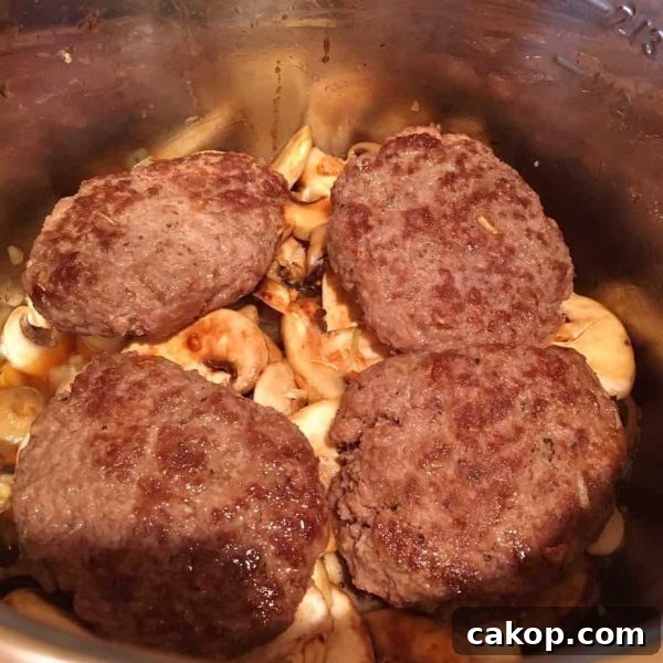 Steaks cooked with mushrooms