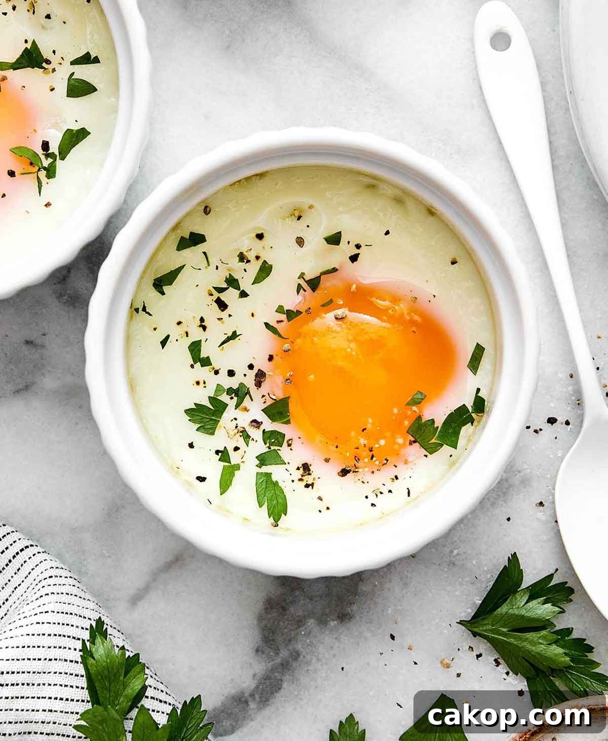 6 Quick Ways to Cook Eggs for Every Meal 6 Baked egg in ramekin.