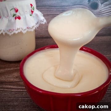 Authentic Amish Cup Cheese Spread Recipe 7 red dish and jar full of Amish cheese spread