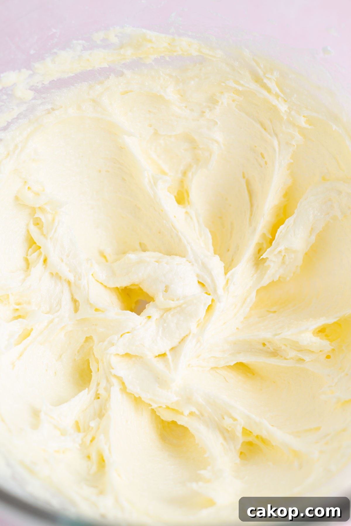 Butter, cream cheese, sugars and eggs beat until fluffy in a mixing bowl