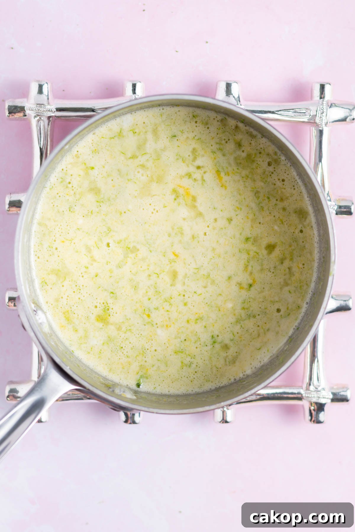 lime curd ingredients mixed in a saucepan prior to cooking