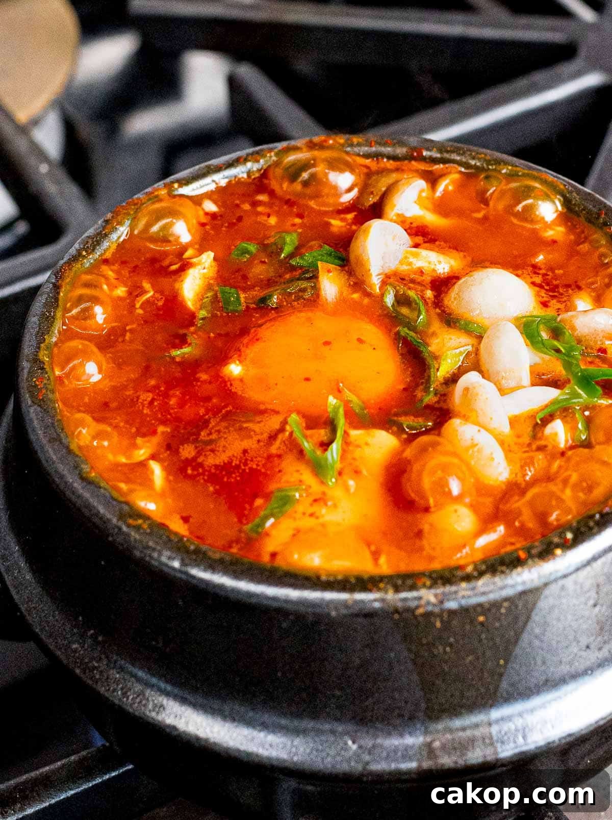 Spicy Korean Soondubu Jjigae (Silken Tofu Stew Recipe) 3 Korean tofu soup made with mushrooms, egg, and soondubu.